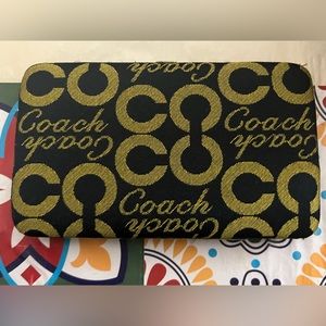 Coach gold and black clutch